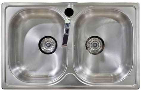 In bathrooms, a smelly sink can often be caused by stray hairs that become lodged in soap scum that starts to line the drain. How to Clean a Smelly Kitchen Sink | Benjamin Franklin ...