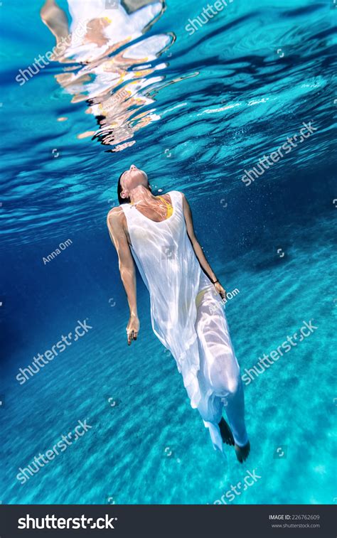 Beautiful Female Wearing White Dress Underwater Stock Photo 226762609
