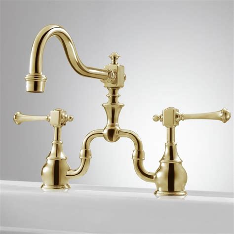 If you're considering brass kitchen faucets, another option is a antique brass kitchen faucet. Vintage Bridge Kitchen Faucet - Lever Handles - Kitchen ...