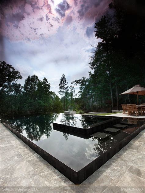 Cool And Unique Idea Of A Black Reflective Infiniti Pool With Hidden