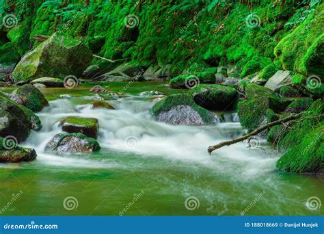 Mountain River Stream In Spring Long Exposure Crystal Clear Water