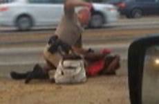 woman freeway punching punched police cop la highway usatoday shows