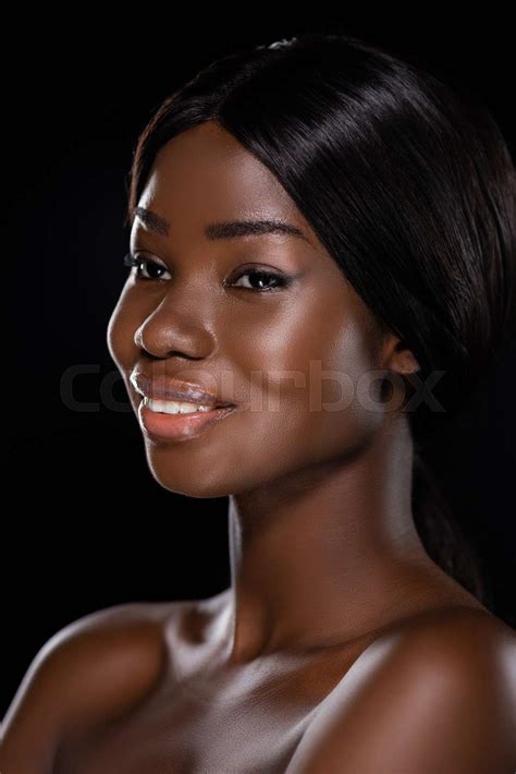 Portrait Of African American Naked Woman Smiling Isolated On Black