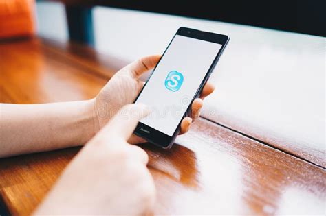 Skype lite is lightweight, quick to download and runs fast on most popular android devices. CHIANG MAI, THAILAND - FEB. 16,2019: Woman Holding HUAWEI ...