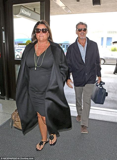 Pierce Brosnan And Wife Keely Shaye Smith Jet Out Of LAX Autumn