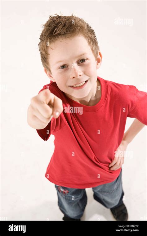 Boy Pointing Upwards Stock Photo Alamy