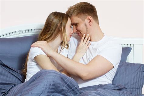 Beautiful Loving Couple Kisses And Hugging On Bed In The Morning Stock Image Image Of Happy