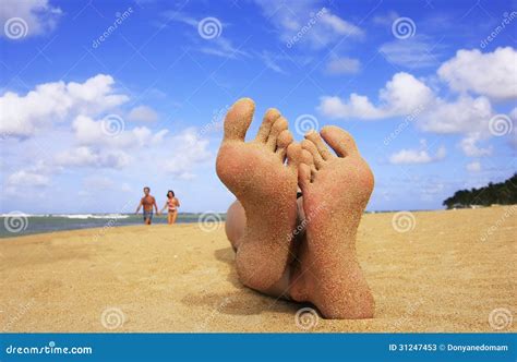 Sandy Feet On A Beach Stock Photos Image