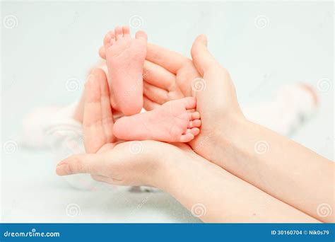 Little Baby Feet And Hands Of The Mother Stock Photo Image Of