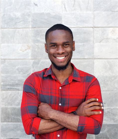 Black Man Smiling Arms Crossed Against Gray Wall Stock Photos Free