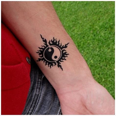 Classic yin yang tattoos on wrists. 15 Yin Yang tattoo designs for men and womenDesign of Tattoos