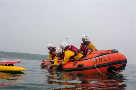 Lifeguards And Lifeboat Crew Carry Out Rescues During Joint Training In