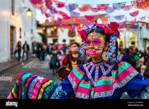 A Mexican Girl Dressed As La Catrina A Mexican Pop Culture Icon