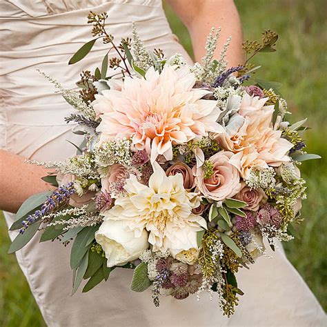 A Rustic Romantic Bouquet Of Dahlias And Roses Tying The