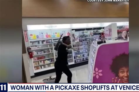 Los Angeles Woman Wielding A Pickaxe Steals Out Of Rite Aid Caught On Video