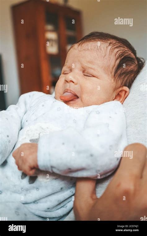 Newborn Baby Really Angry At Home Stock Photo Alamy