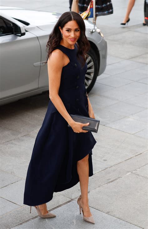 Meghan Markle Wears Navy Blue Outfits To Be Professional Experts Say