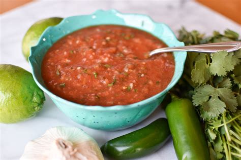 Summertime Salsa With Two Spoons