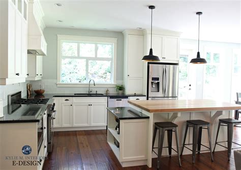 I had a dark black polished granite for years and we switched it out for white marble a few years ago — it is so much easier to keep clean looking. Country farmhouse style kitchen with Cloud Whtie cabinets ...
