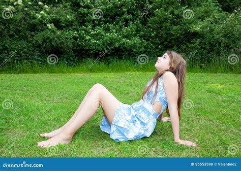 Girl Sitting On Grass Stock Photo Image Of Spring Teenager