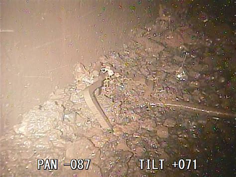 tepco unveils footage of deposits inside fukushima reactor the mainichi