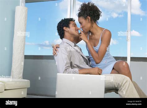 African Woman Sitting On Babefriend S Lap Stock Photo Alamy