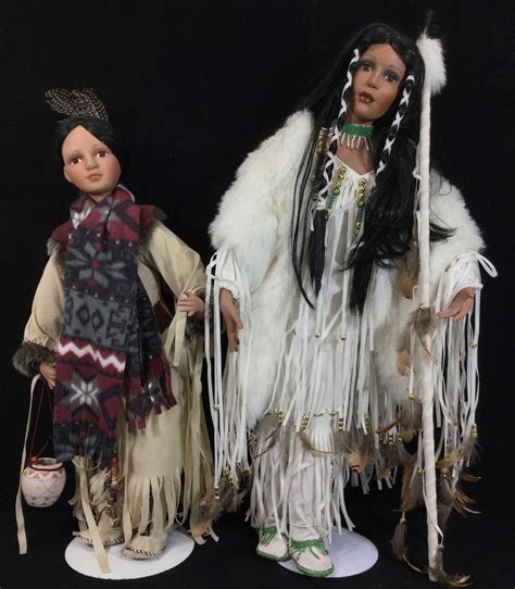 lot pair of native american porcelain dolls