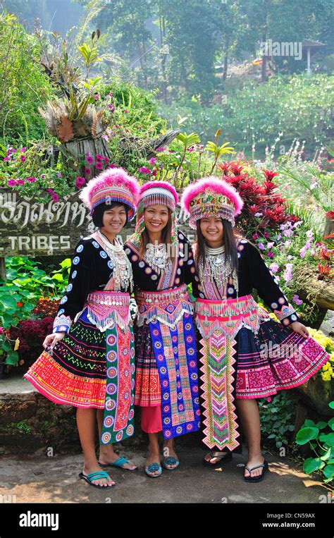 Akha Hill Tribe Group In Traditional Dress At Village Museum And Gardens Near Chiang Mai