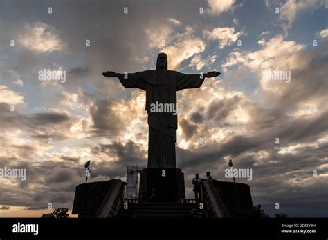 Beautiful View To Christ The Redeemer Statue Under Sunset Clouds