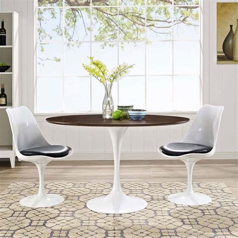 You can also use the emi option available on flipkart if the price exceeds your budget. Lippa 48" Oval-Shaped Walnut Dining Table - Modern In Designs