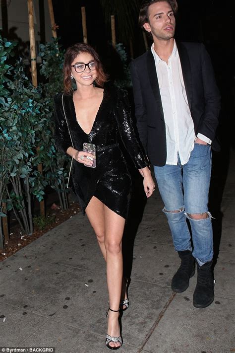 sarah hyland gives a flash of cleavage in plunging sequin lbd in la daily mail online