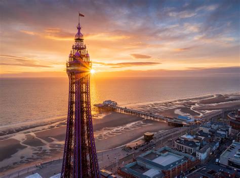 Download Blackpool Tower And The Beach At Sunset Wallpaper