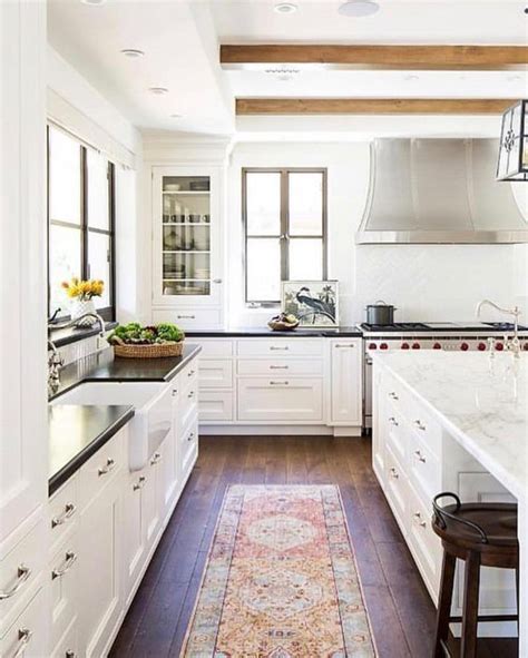 Dead space (not the most ideal for storage, but placing your cabinets at 90 degree angles eliminates the corner altogether.) Beautiful Kitchen Inspiration from Pinterest - jane at ...