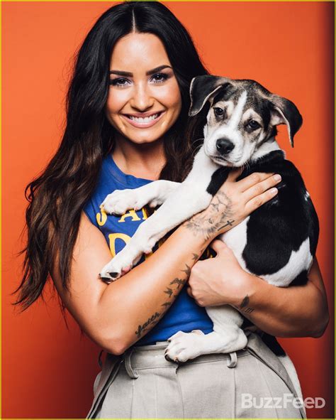 Demi Lovato Plays With Puppies In Adorable New Video Watch Now