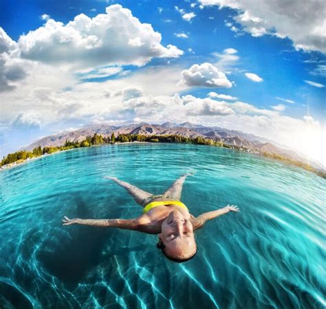 Premium Photo Woman Swimming In The Mountain Lake