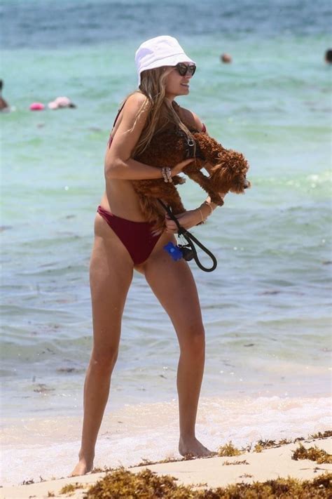 Roosmarijn De Kok Cools Off At The Beach With Her Beau 34 Photos