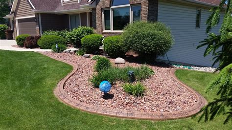 A row of concrete bricks provides a polished, formal look to the edges of flower beds, patios, walkways and driveways. Concrete Curbing - Decorative Concrete