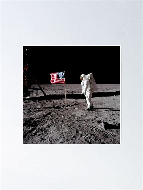 Astronaut Salutes The American Flag During An Apollo 11 Moonwalk