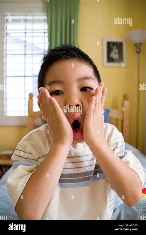 Little Boy Making Faces Stock Photo Alamy