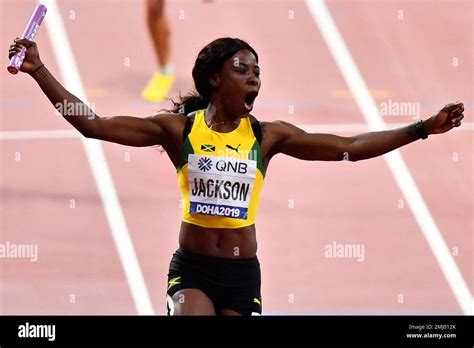 shericka jackson of jamaica crosses the finish line to win the women s 4x100 meter relay final