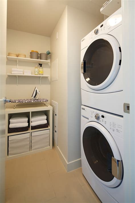 Inspired full size stackable washer and dryer Contemporary Laundry Room