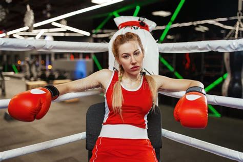 Woman In Gloves Sitting In Corner Of Boxing Ring Stock Image Image Of Athletic Kickboxing