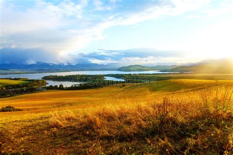 Beautiful Landscape With A Lake And Mountains In The Background And