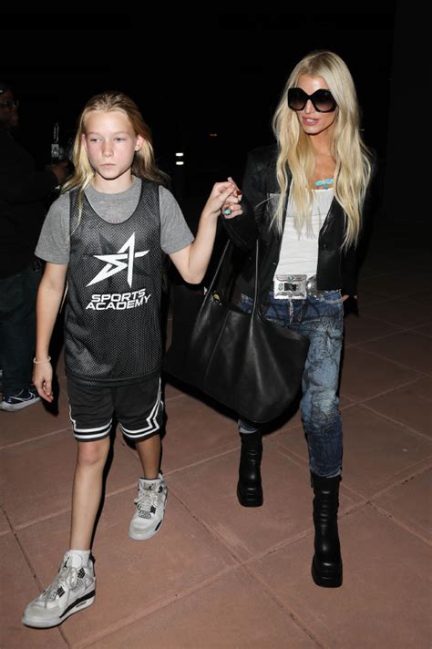 Jessica Simpson Daughter Maxwell Hold Hands At Basketball Game