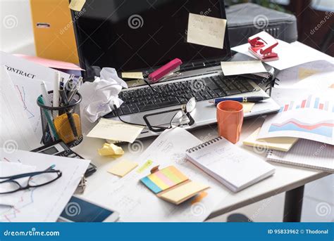 Messy And Cluttered Desk Stock Photo Image Of Workplace 95833962