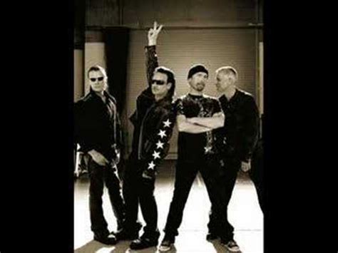 We see them burnin' crosses see the flames, higher and higher. U2 Bullet The Blue Sky Videos de musica online con lyrics ...
