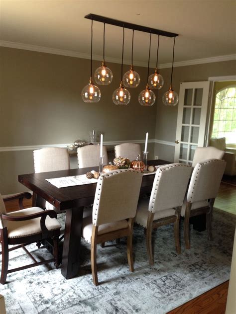 Glass Pendant Lights Over Dining Table On A Budget At Light Wood Dining Table Set Iluminación
