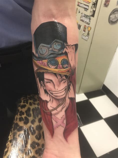 It gives you a modern look with the colorful design while also being unique. My new One Piece Tattoo!!! : OnePiece