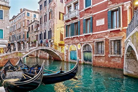 Gondolas At The Ponte De La Cortesia In Venice Italy Stock Image