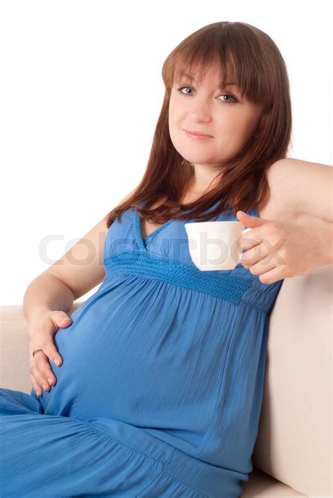 pregnant girl drinks tea stock image colourbox